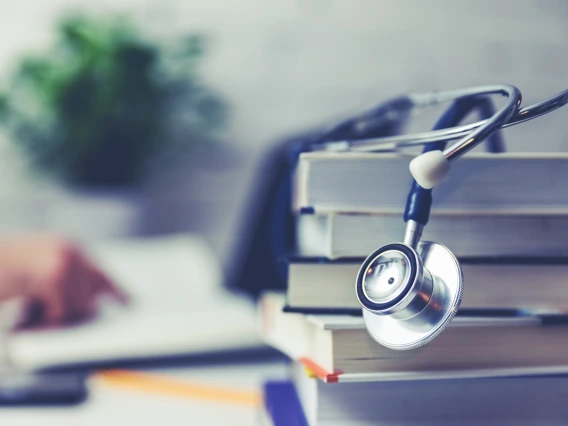 Stack of medical college books