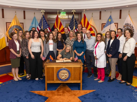 Dr. Emerick attends ceremonial bill signing
