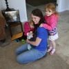 Carolyn Larsen and her kids, in a photo by Jack Orleans of Cronkite News